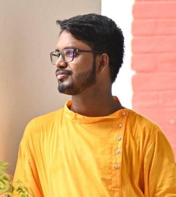 বিবর্ণ মুখের কবি